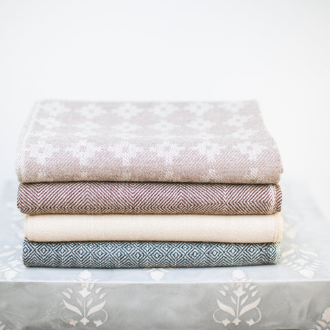 100% baby alpaca throw blankets are soft, elegant and comparable to cashmere in quality